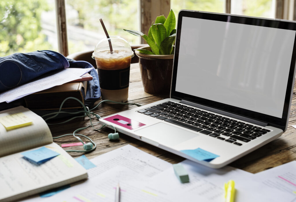 Blank screen laptop on a desk